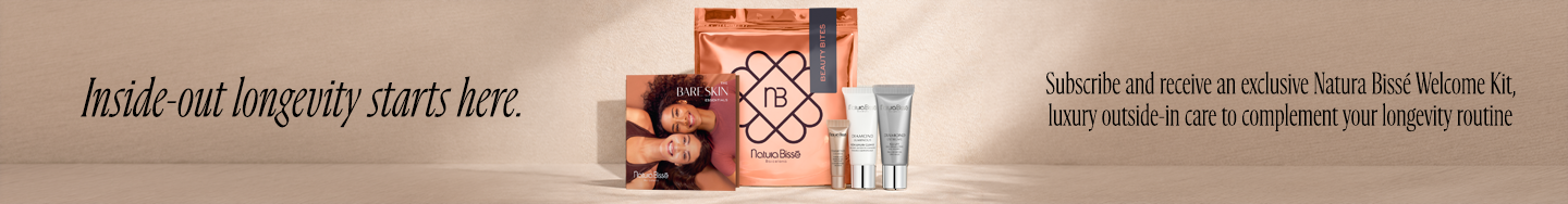 A promotional banner displaying a collection of Natura Bissé skincare products against a beige background with text.