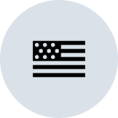 A stylized black icon of the American flag with dots for stars, inside a light gray circle.