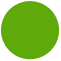 A solid green circle on a white background.