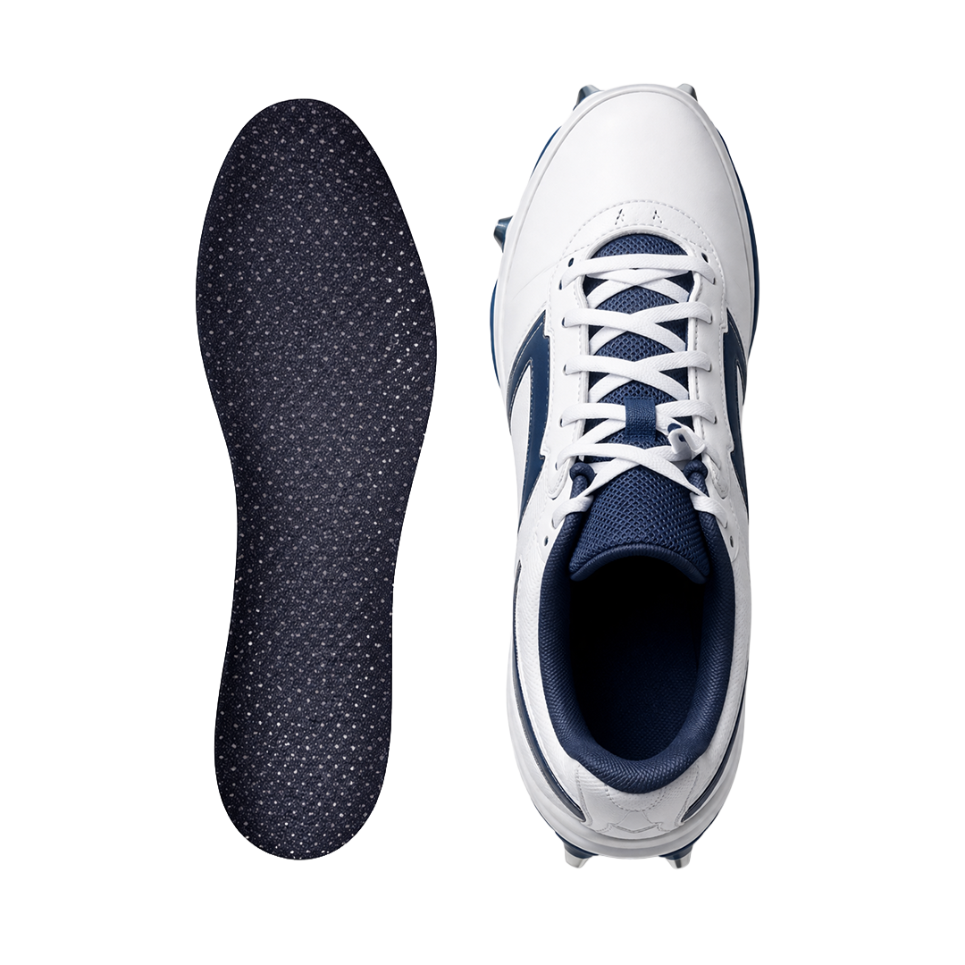 A top-down view of a white and blue golf shoe next to its dark blue insole.