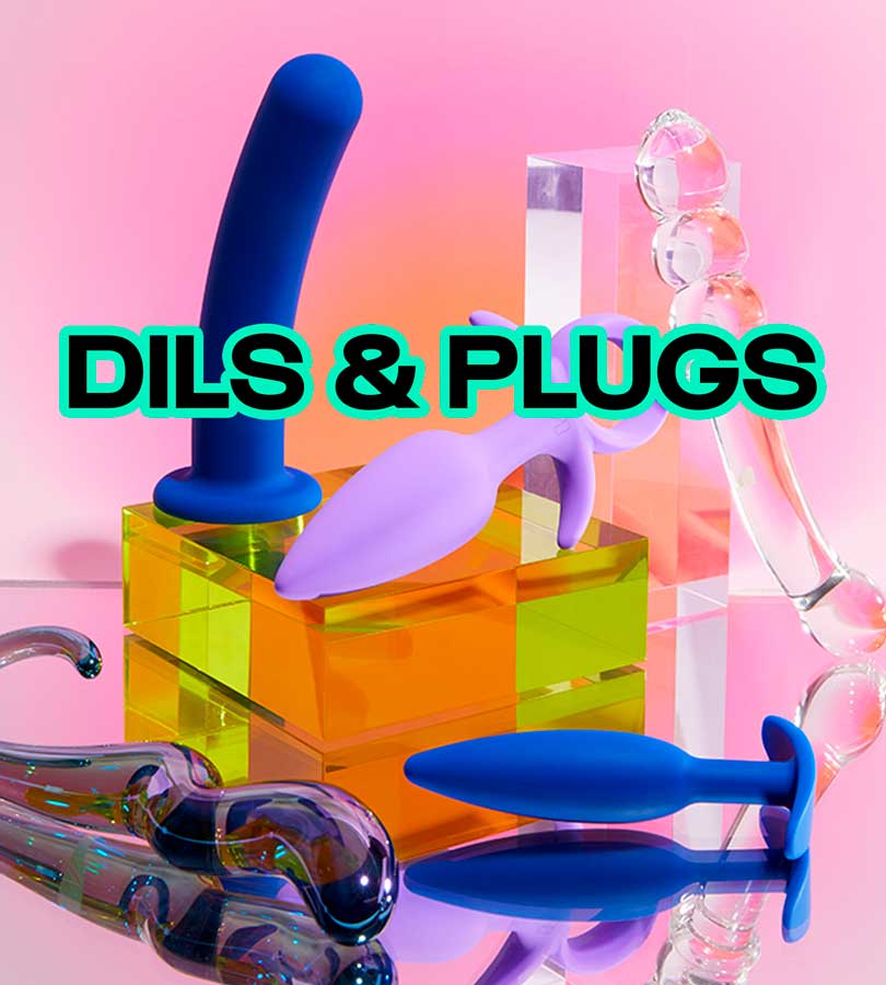 A colorful assortment of dildos and plugs on a reflective surface with the text 'DILS & PLUGS'.