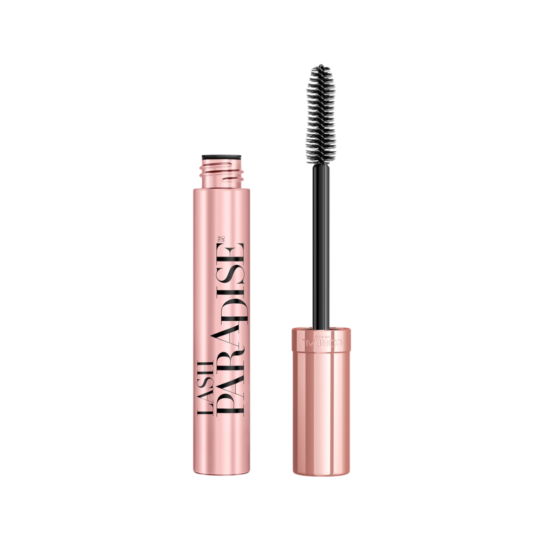 An open tube of L'Oréal Lash Paradise mascara with the wand applicator resting next to it.