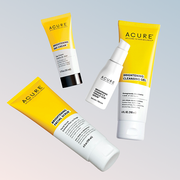 Four Acure skincare products on a gradient background.