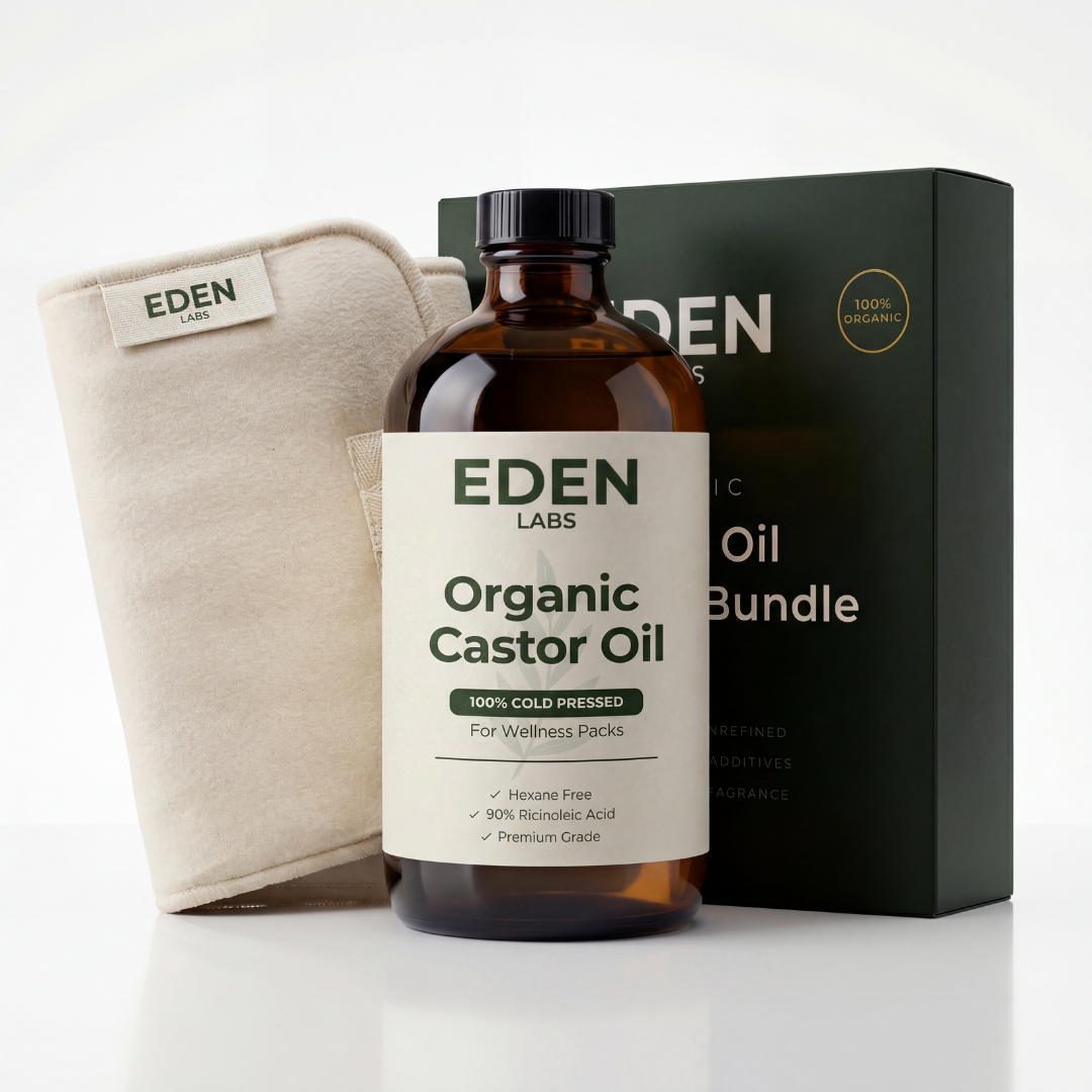 A bottle of Eden Labs Organic Castor Oil with its box and a cream-colored wellness pack on a white surface.
