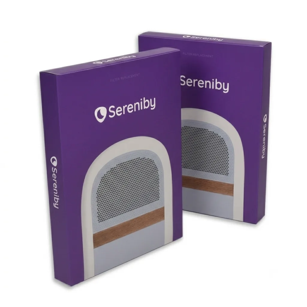 Two purple boxes for Sereniby filter replacements standing on a white surface.