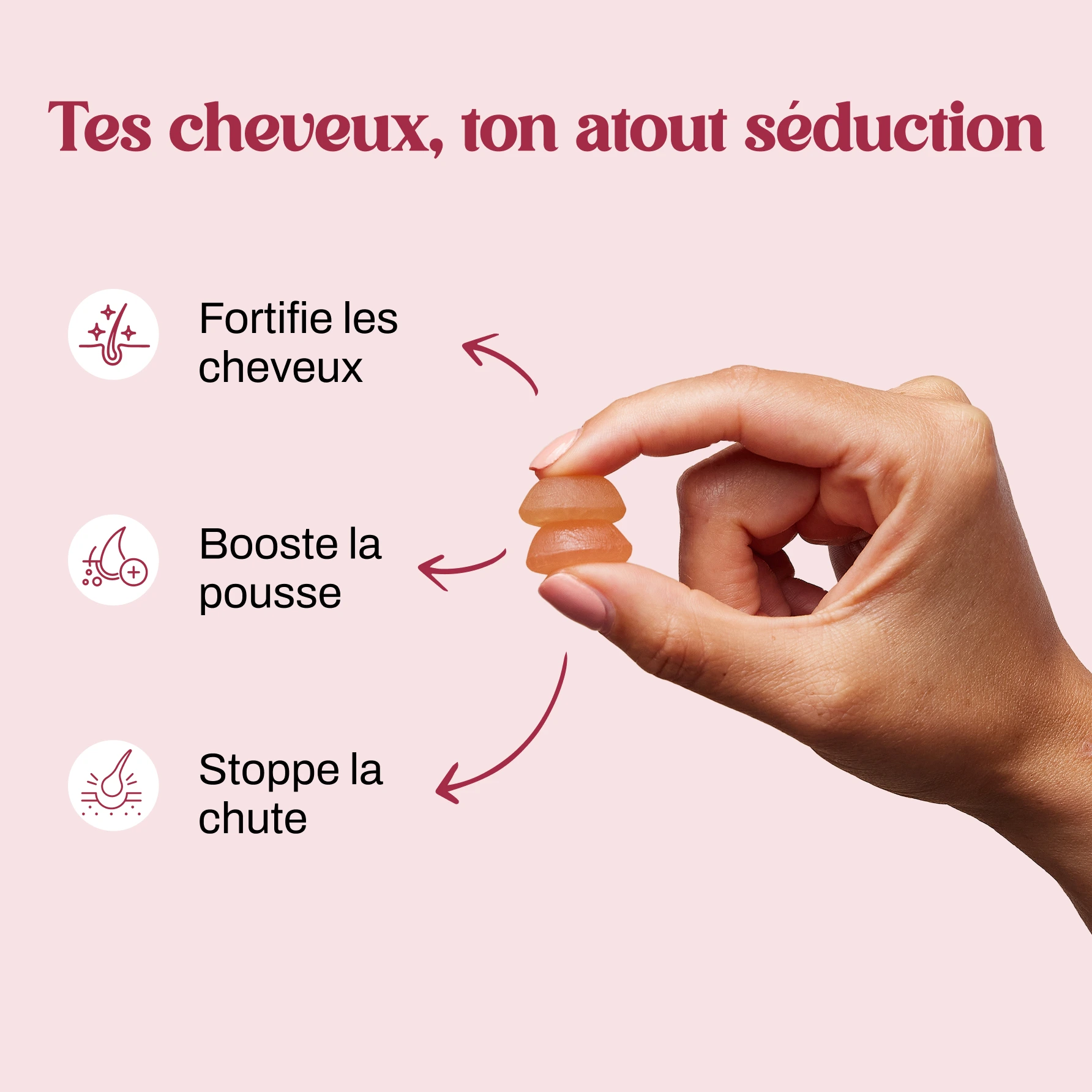 A hand holds two gummy vitamins, with text and icons in French describing hair benefits.