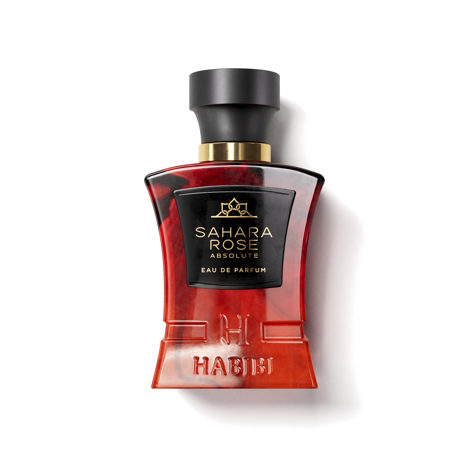 Red perfume bottle labeled 'Sahara Rose Absolute' with a black cap.