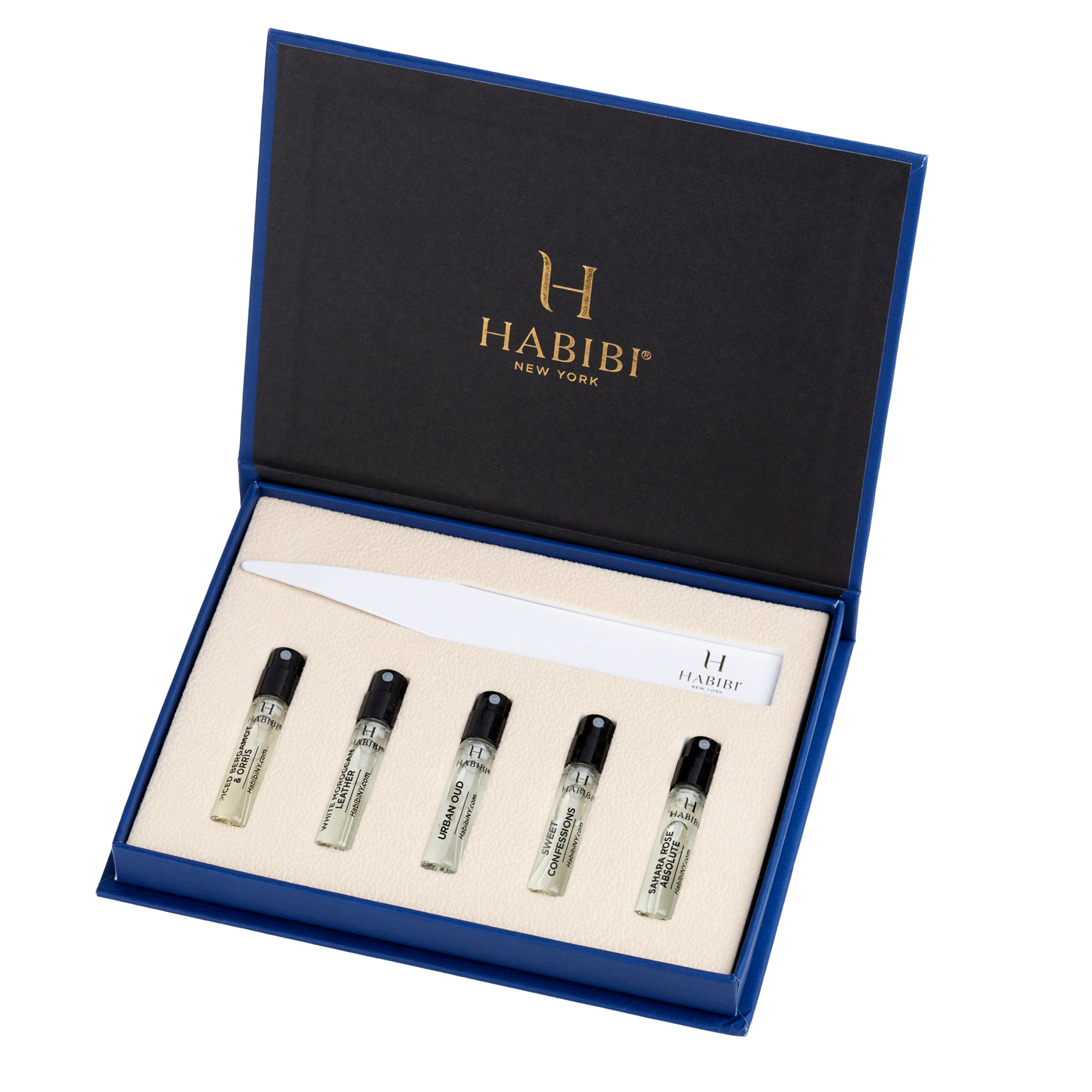 Open box with six small perfume bottles and a fragrance strip.