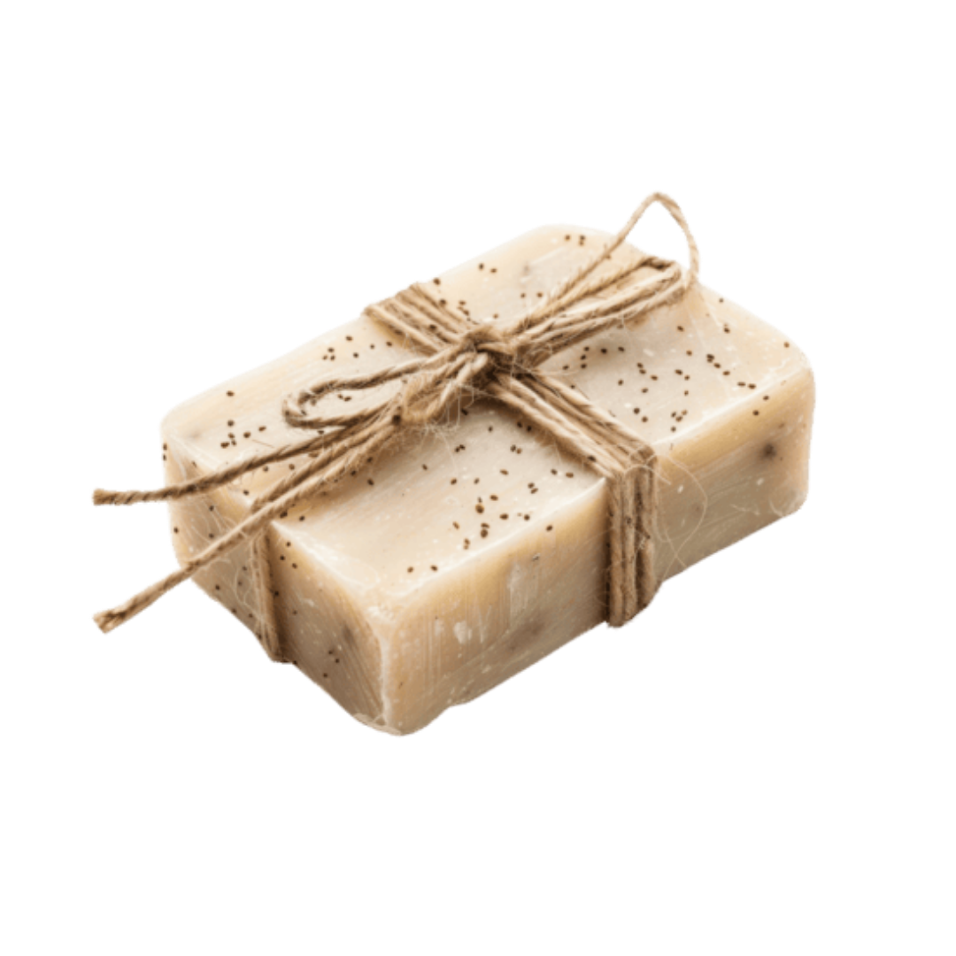 A rectangular bar of speckled soap, tied with twine in a bow, on a white background.