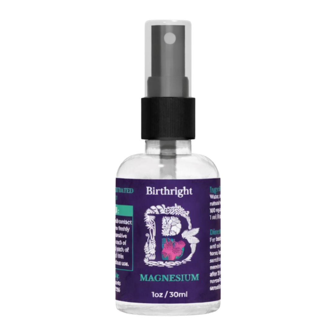 Transparent spray bottle labeled 'Birthright Magnesium,' with a purple label and floral design.