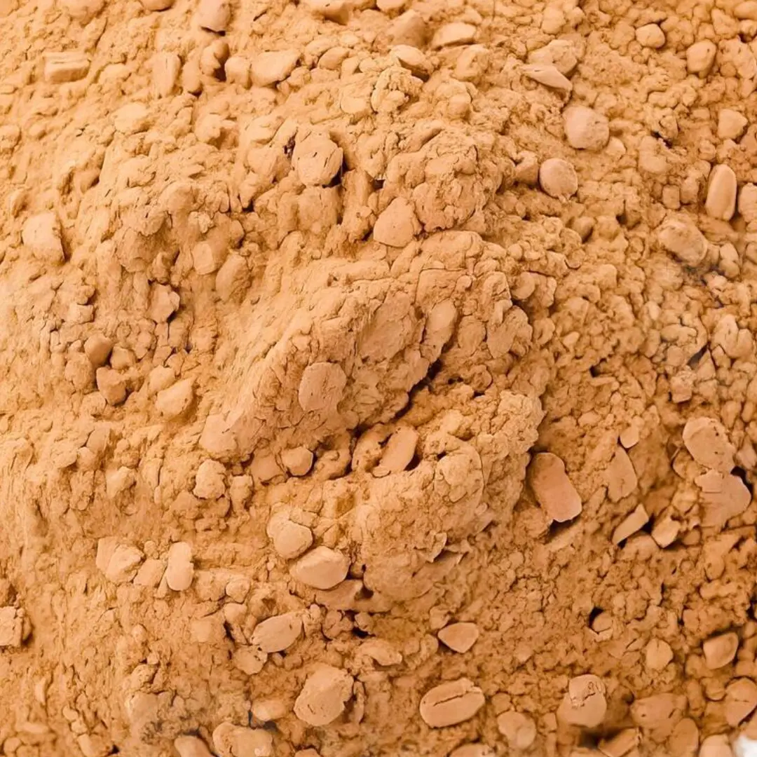 Close-up of a pile of coarse brown powder.