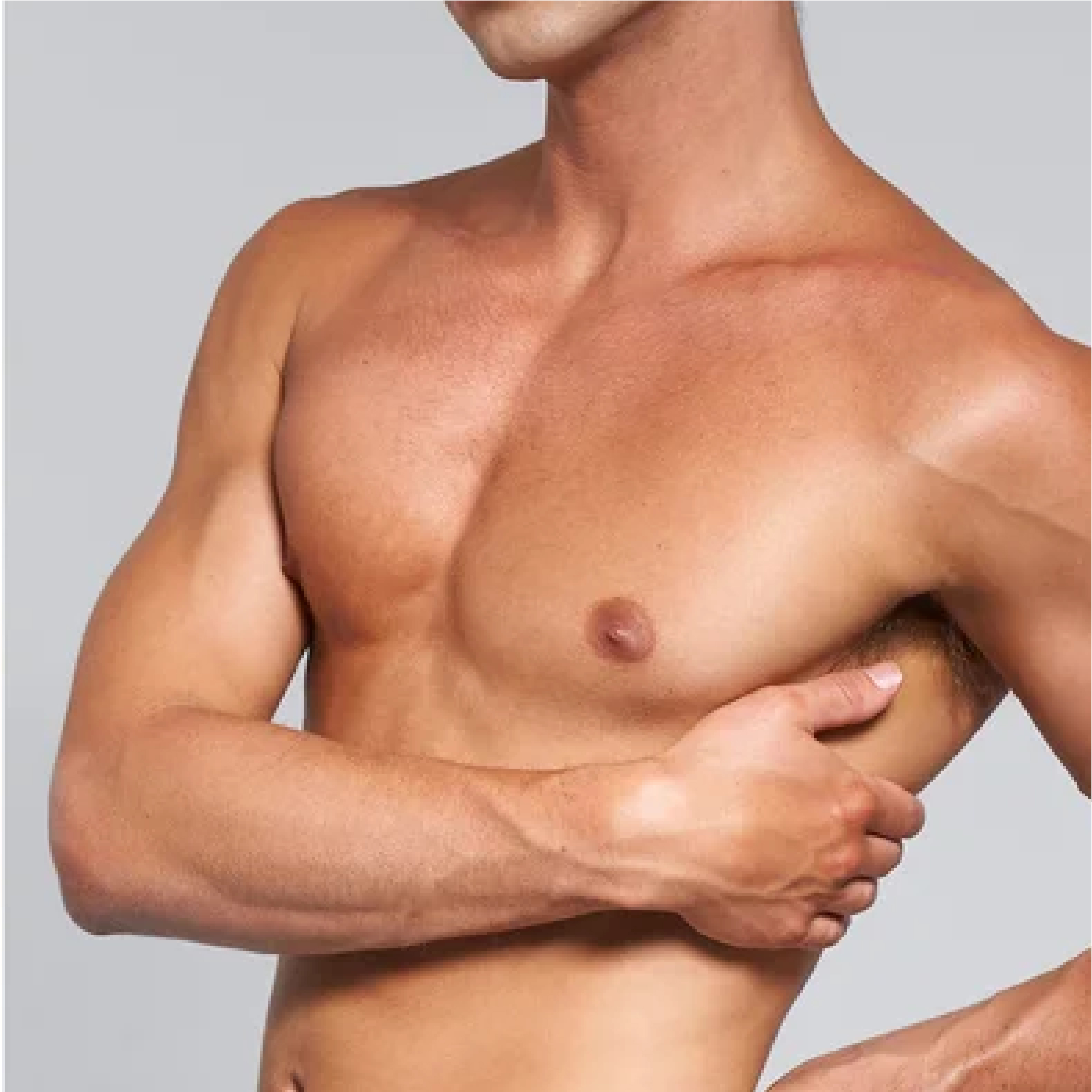 A close-up shot of a muscular man's bare torso against a plain grey background.