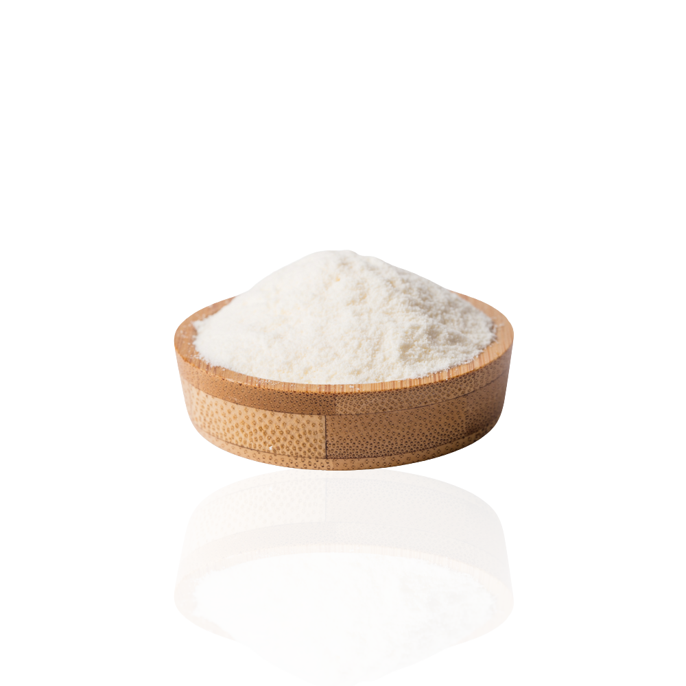 Wooden bowl filled with white powder on a reflective surface.