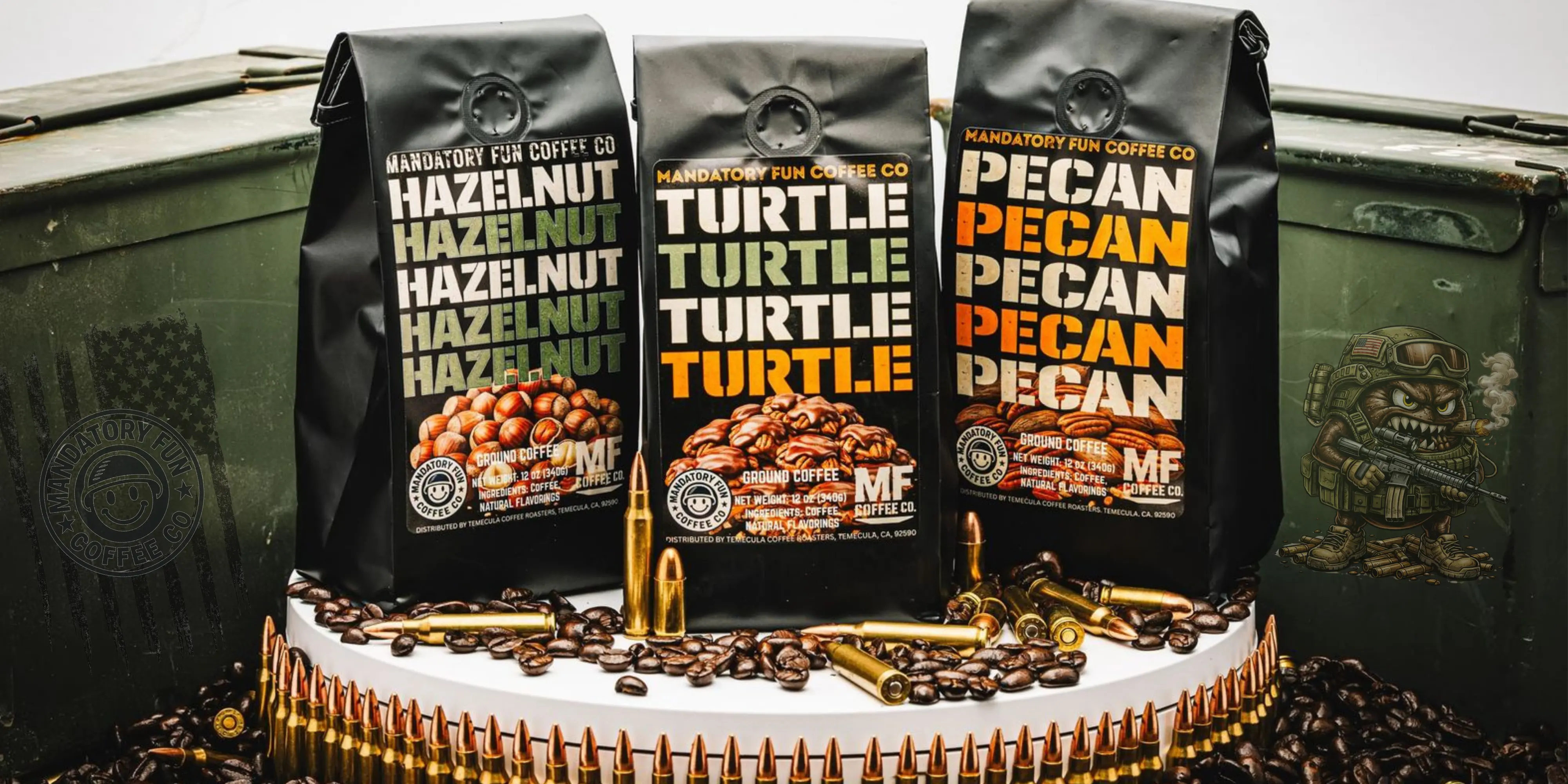Three bags of Mandatory Fun Coffee Co. coffee displayed with coffee beans and bullet casings.