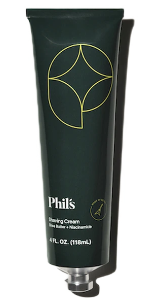 Green tube of Phil's shaving cream with gold geometric design.