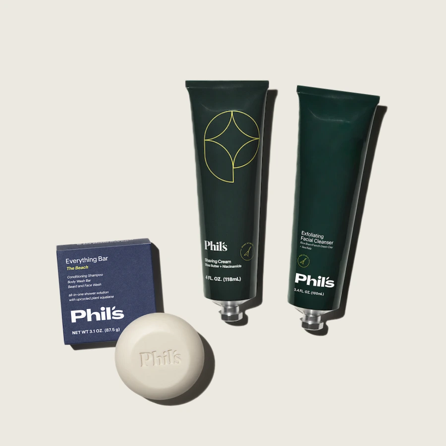 Skincare set with shaving cream, exfoliating cleanser, and soap bar from Phil's.