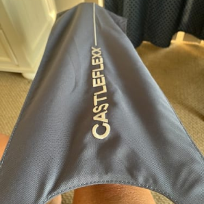 Customer photo of a foot resting in a gray CastleFlexx strap