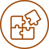 A circular brown icon of four puzzle pieces being assembled.