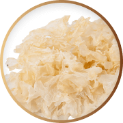 Close-up of white, textured, crumpled material in a circular frame.