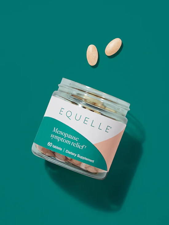 Jar of Equelle menopause symptom relief tablets on a teal background.