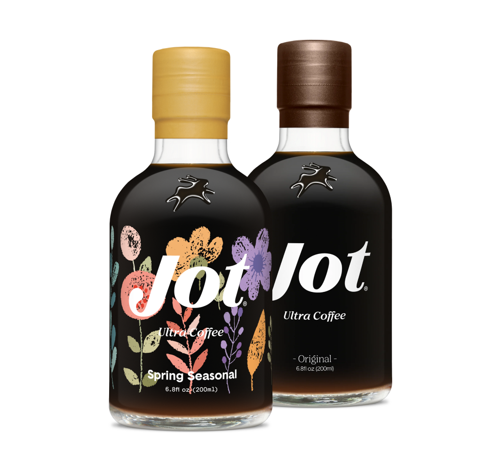 Two Jot Ultra Coffee bottles, one with floral design, one plain.