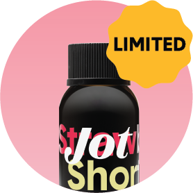Black bottle with 'Limited' badge on pink background.