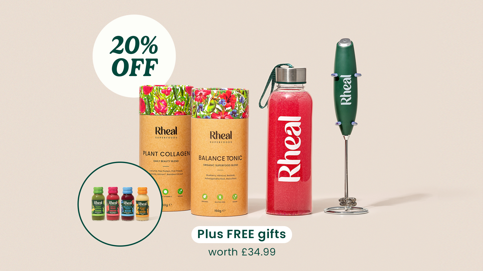 A promotional image for Rheal Superfoods showing various products, including drink mixes, a bottle, and an electric whisk.