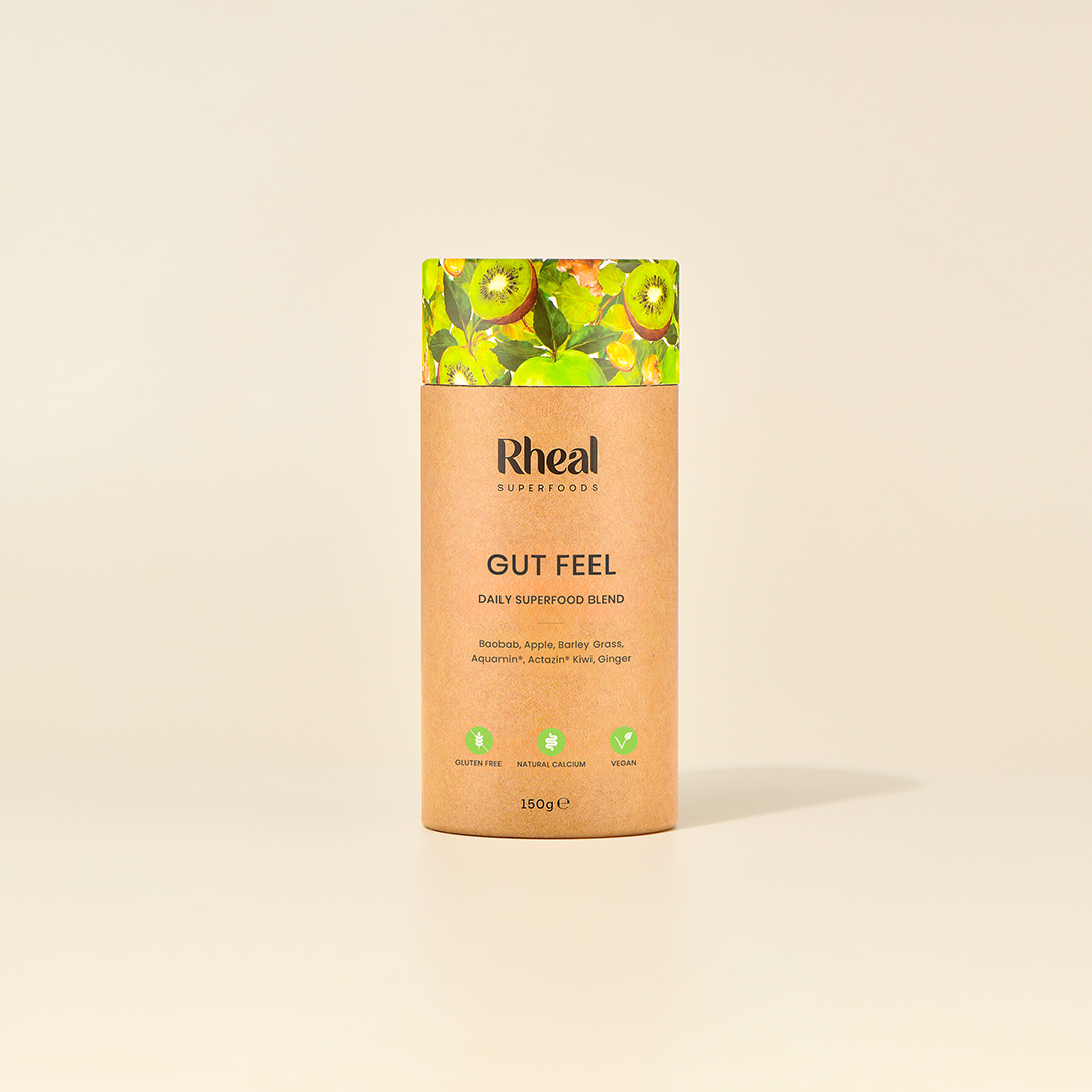 A package of Rheal Superfoods ‘Gut Feel’ daily superfood blend on a plain background.