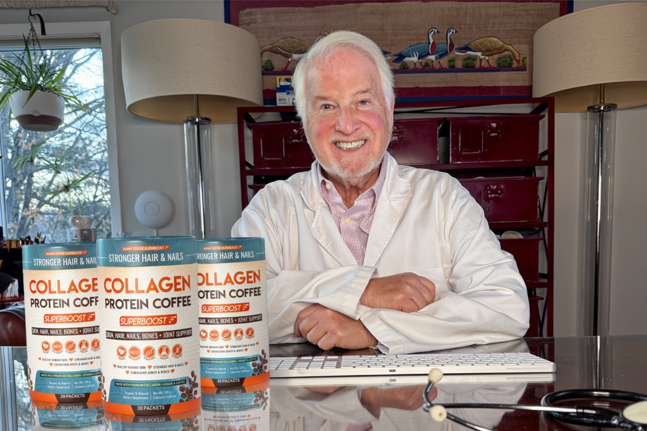 Older man in white coat behind collagen protein coffee packages on a table.