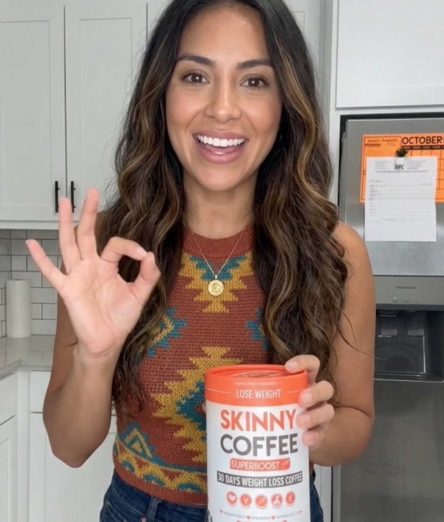Red-haired woman with Skinny Coffee.