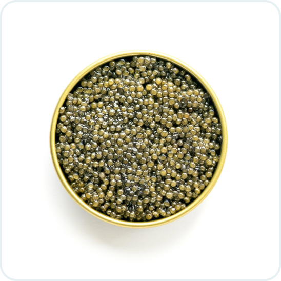 A top-down view of a round, gold-colored tin of caviar on a white background.