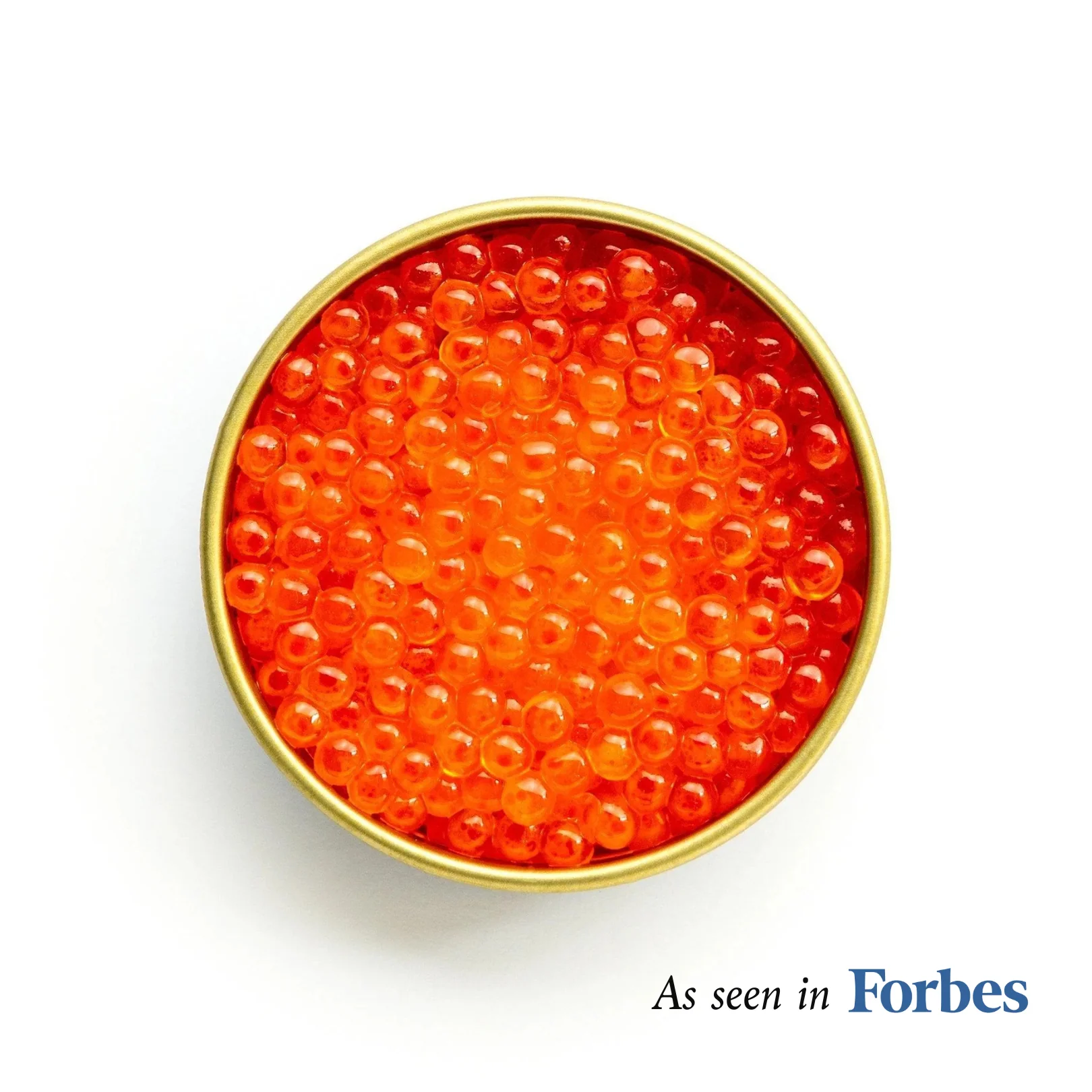 An overhead view of an open tin of red caviar on a plain white background.