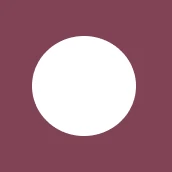 White circle on a maroon background.
