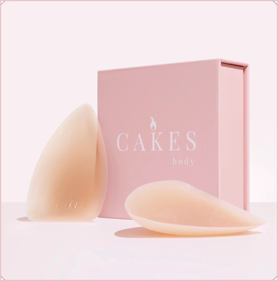 Two silicone pads and a pink box labeled 'CAKES body'.