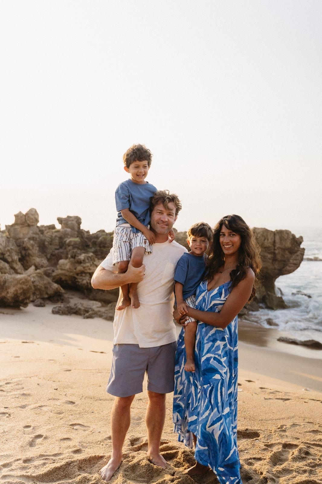 Kim and Peter with their children at the beach