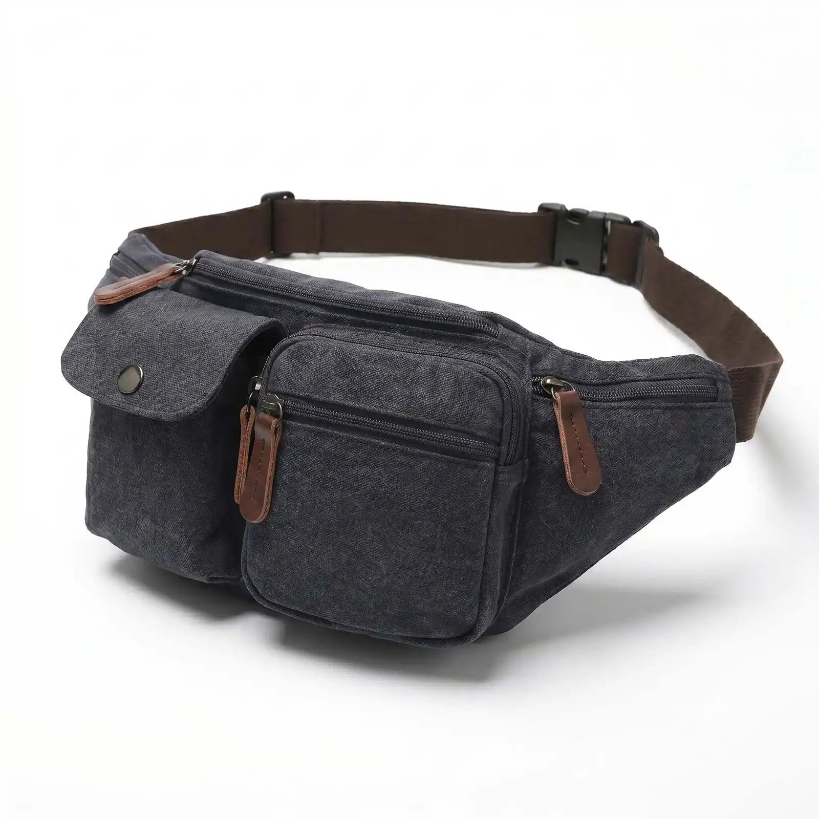 A dark gray canvas fanny pack with multiple pockets and a brown strap, against a white background.