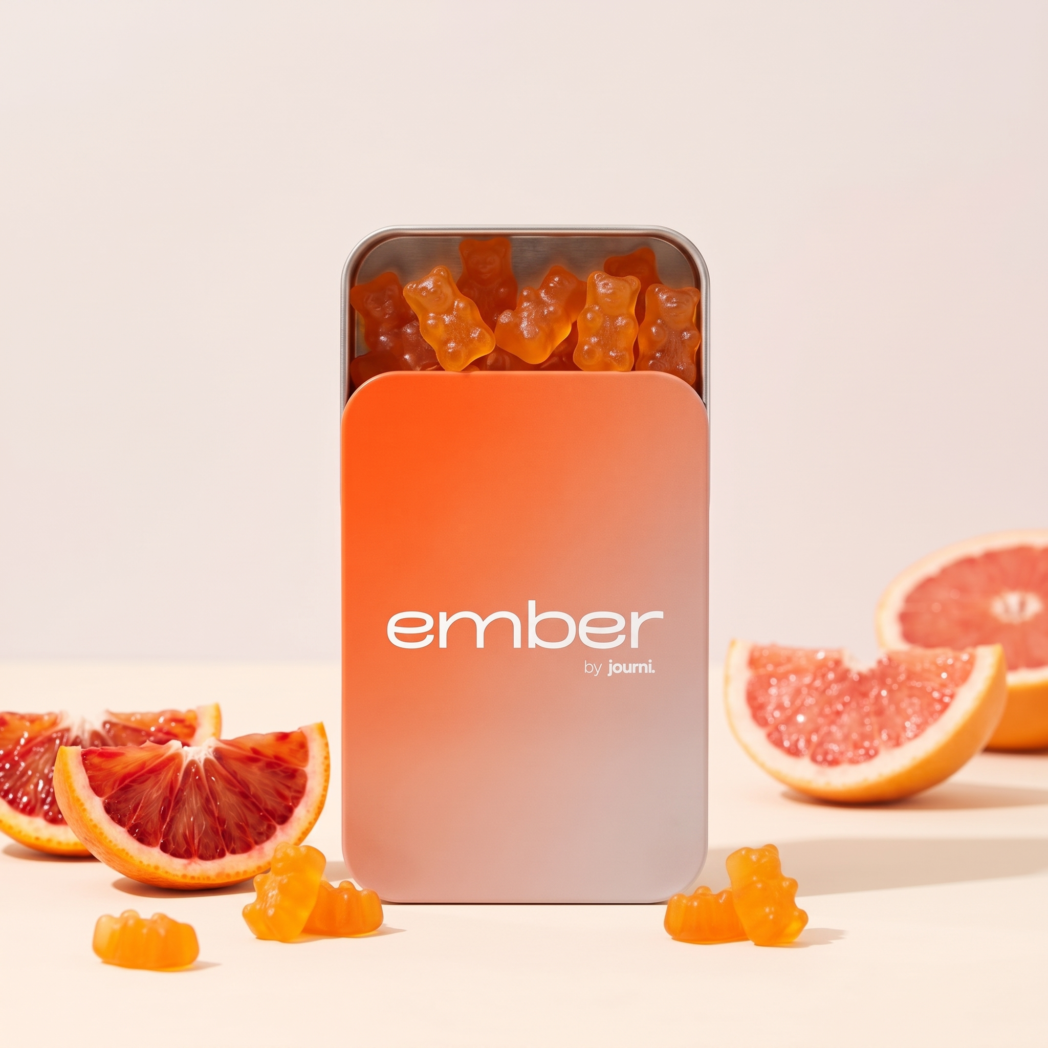 An orange jar of Ember by Journi hormone support gummies, which are bear-shaped and orange.