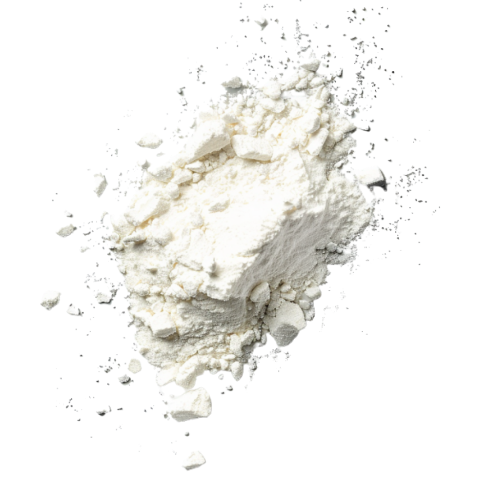 A pile of fine white powder with scattered particles on a solid green background.