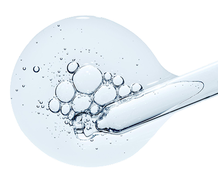 Clear liquid with bubbles and a dropper.