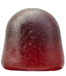 A close-up of a single reddish-purple fruit snack on a white background.