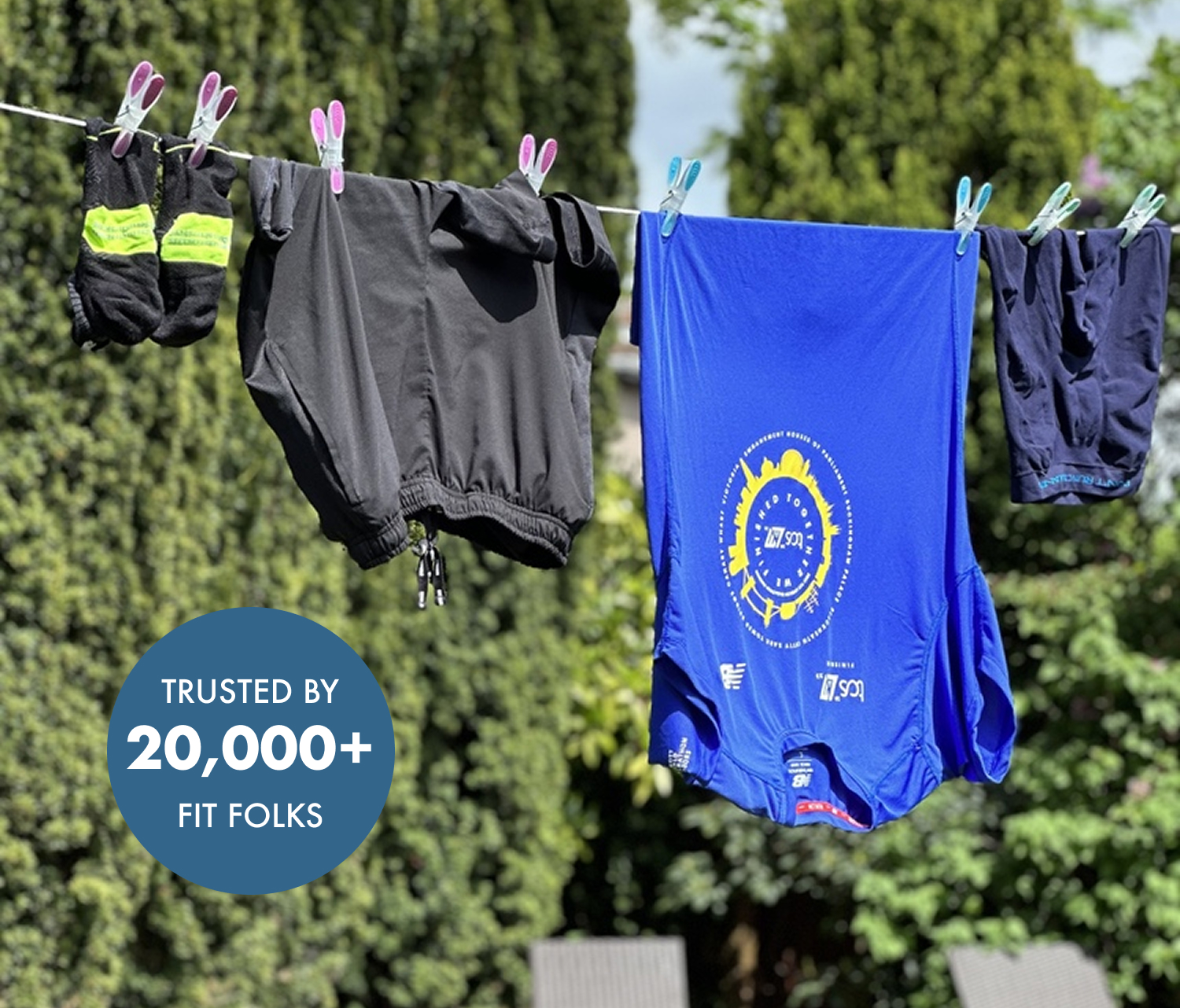 Clothes hanging on a line outdoors with a 'Trusted by 20,000+ fit folks' badge.