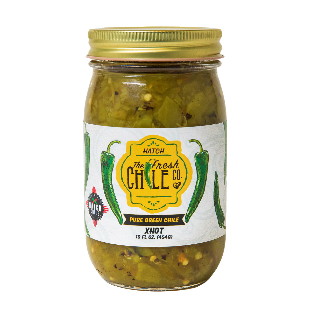 A glass jar of Hatch The Fresh Chile Co. XHOT Pure Green Chile on a white background.