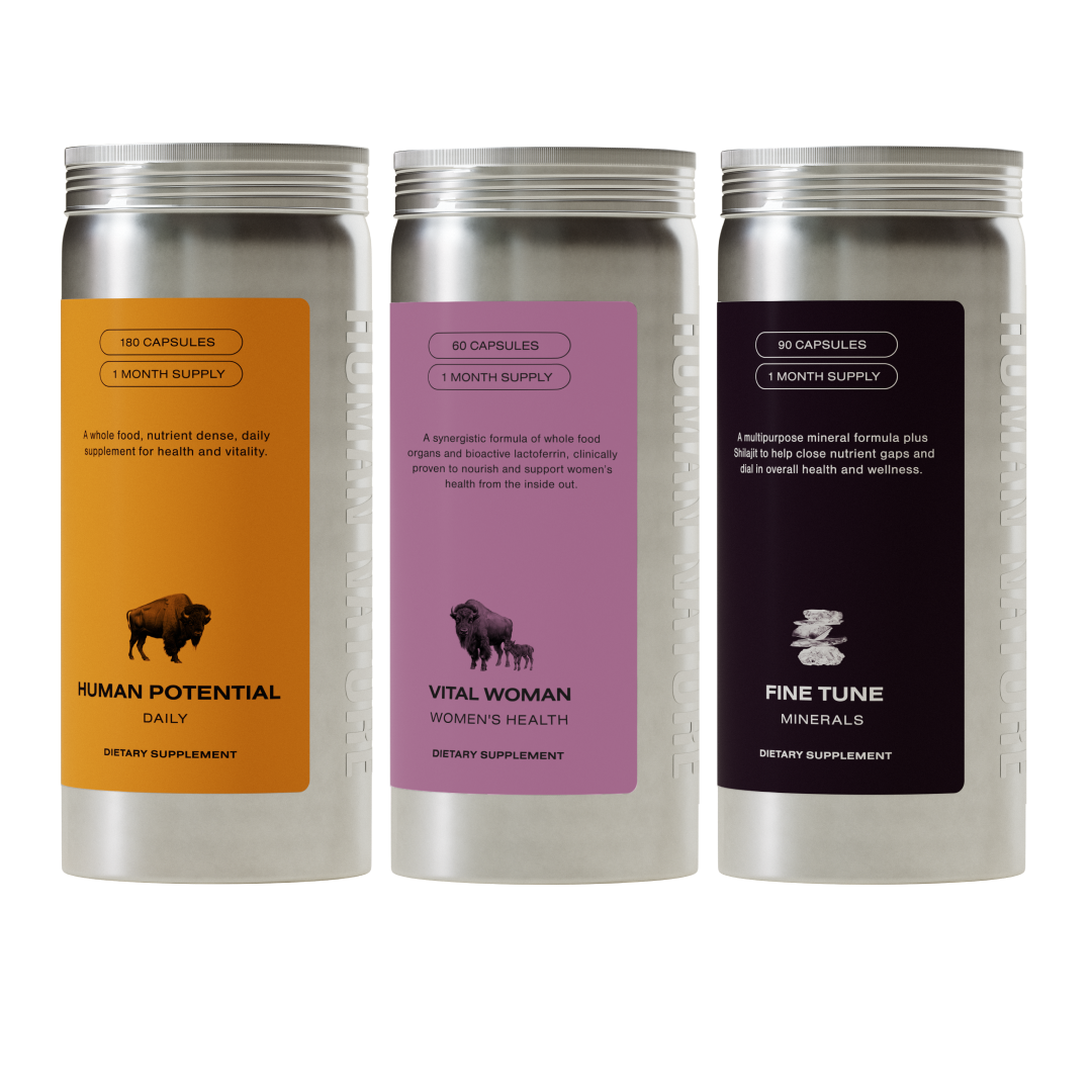 Three silver canisters of dietary supplements labeled Human Potential, Vital Woman, and Fine Tune on a white background.