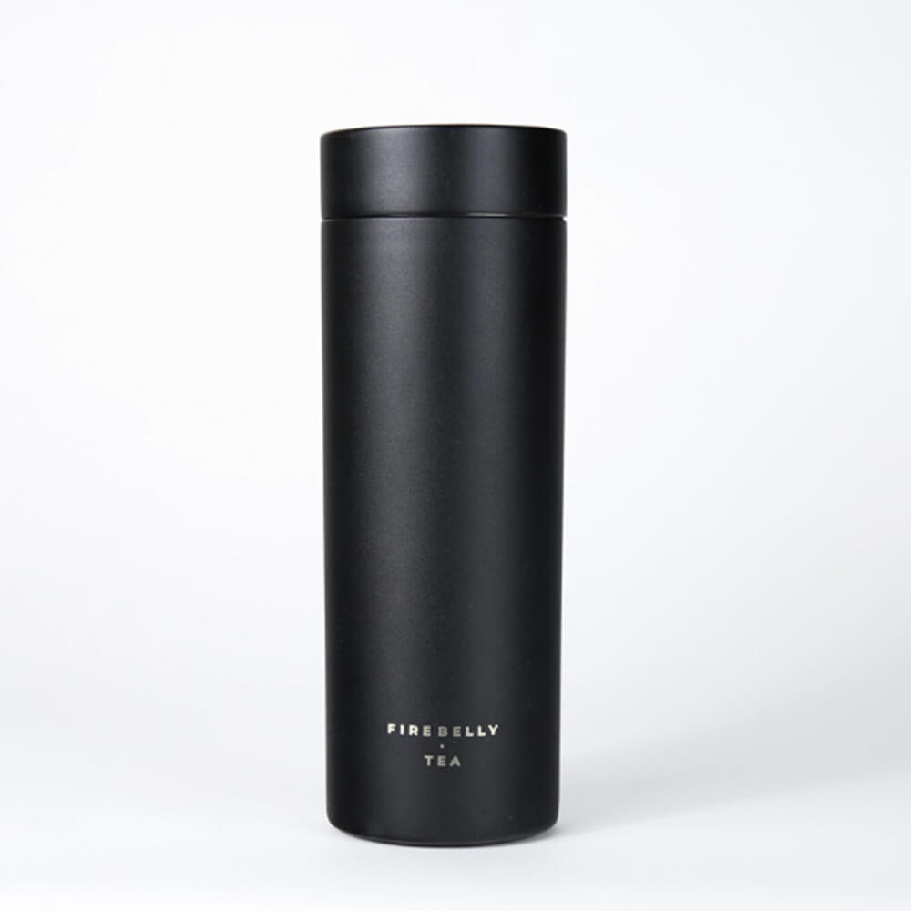 A matte black Firebelly Tea travel thermos on a plain white background.