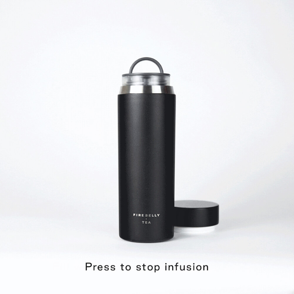 An animation of a black Fire Belly Tea travel mug demonstrating the press-to-stop infusion feature.