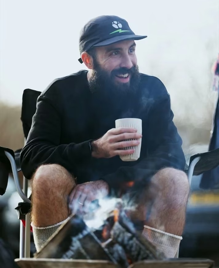 Mike, hylo co-founder, by a campfire