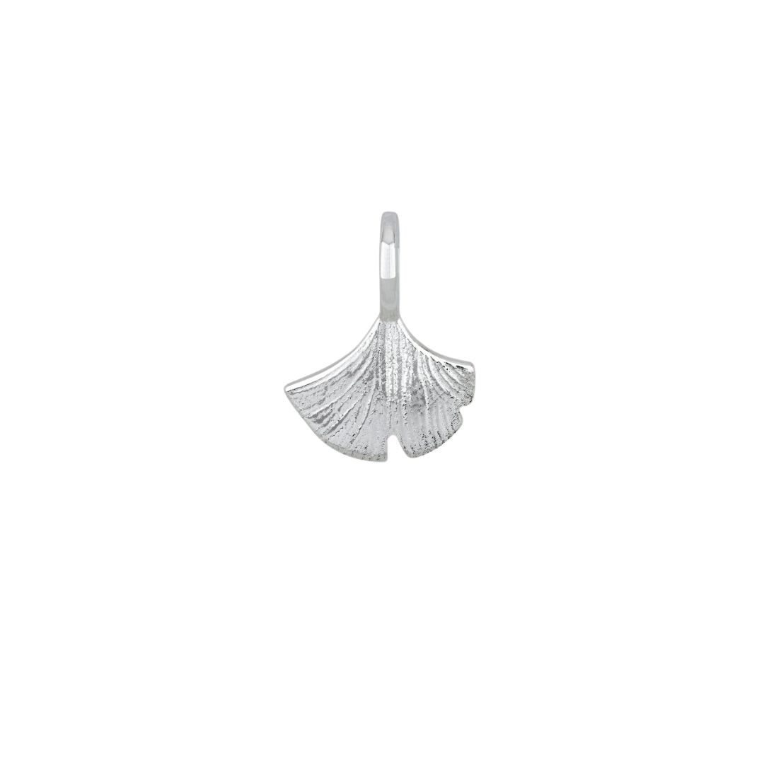 A silver-colored pendant shaped like a ginkgo leaf, shown against a white background.