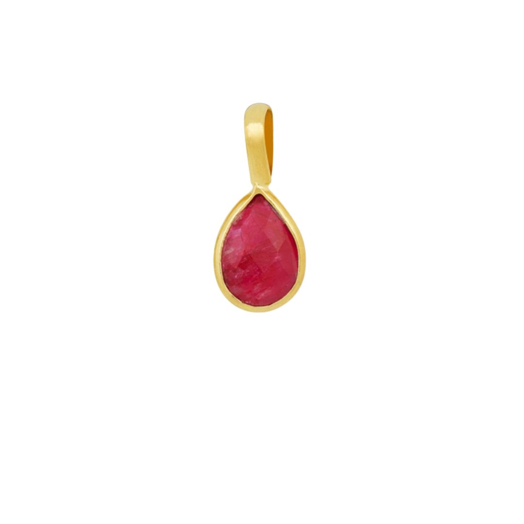 Teardrop-shaped red gemstone pendant with a gold setting on a white background.