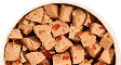 A close-up, top-down view of a bowl of cubed, light-brown food with red specks.