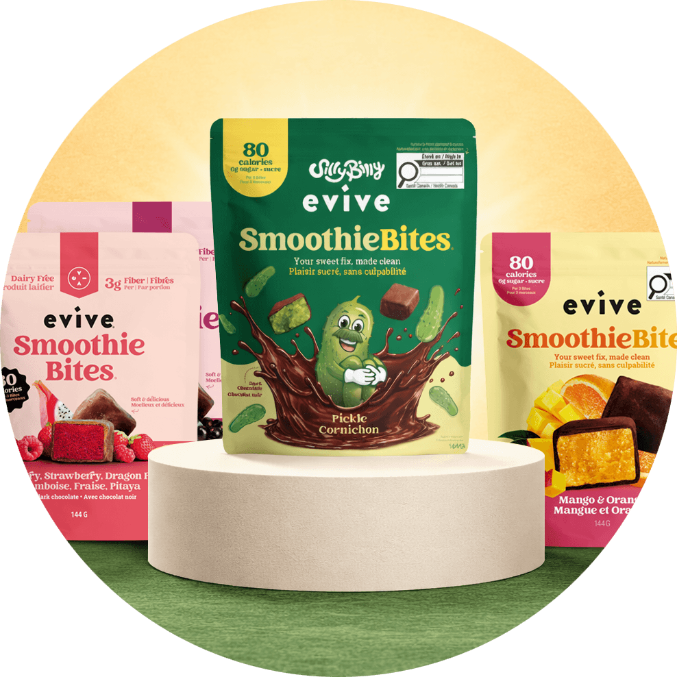 Three packages of evive SmoothieBites, including pickle, raspberry, and mango flavors, displayed on a white pedestal.